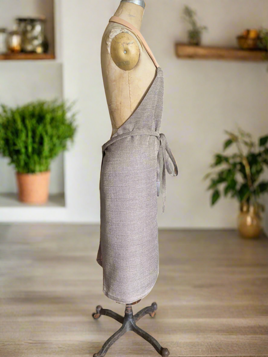 Side view of Equestrian Rose double-sided unisex apron with pocket
