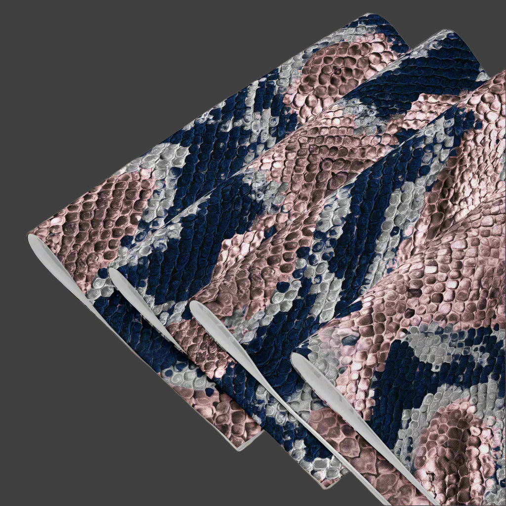 Close-up of serpent placemat showing metallic python print texture