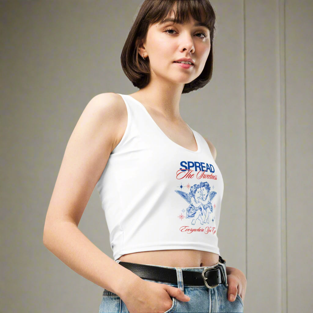 Close-up of woman wearing the angelic cherub design on Sweetness Cherub crop top