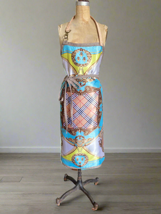 Chameleon apron luxury scarf print side with plaid and aqua pattern displayed on mannequin 