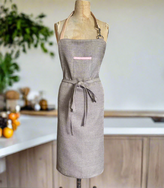 Equestrian Rose apron with elegant pink rim and double-sided design