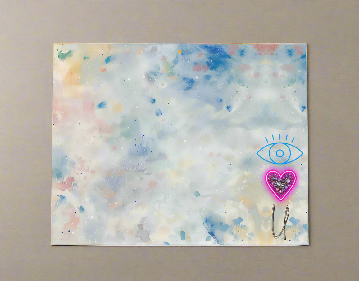 Soft abstract watercolor placemat in pastels with heart-eye graphic in lower corner