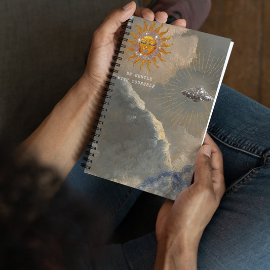Radiant sun spiral journal with jeweled face and UFO