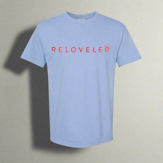 Baby blue t-shirt with red sparkle font and elegant glitter that spells out Reloveler 