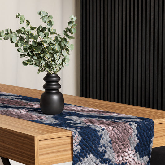 Luxury serpent table runner on elegant dining table showing metallic details